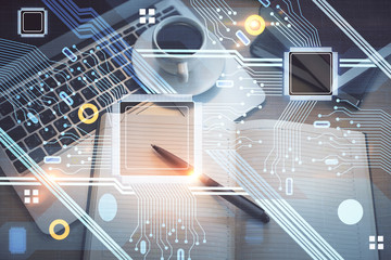 Multi exposure of data theme drawing hologram over topview work desk background with computer. Concept of technology.