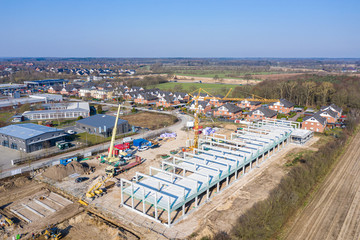  huge company building is erected on a large construction site