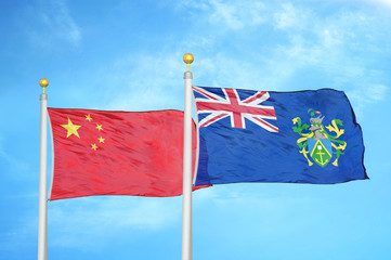 China and Pitcairn Islands two flags on flagpoles and blue cloudy sky