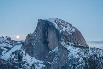 Half Dome and Full Moon. Evening Twilight. Yosemite National Park. California USA