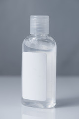 transparent jar with an opening lid. bottle with antiseptic gel