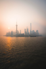 Fototapeta na wymiar Panoramic Cityscape of Shanghai Skyline during Sunrise with orange skies