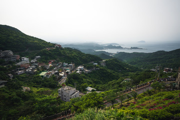Fototapeta na wymiar Image of a Rural Mountainside Town in Taiwan beside the ocean