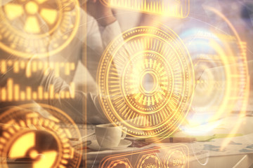 Double exposure of man and woman working together and tech hologram drawing. Technology concept. Computer background.