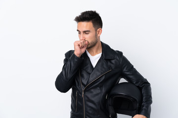 Fototapeta premium Man with a motorcycle helmet is suffering with cough and feeling bad
