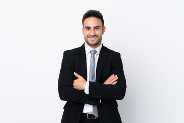 Young business man over isolated background laughing