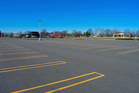 Empty Parking Lot In East Brunswick Mall, New Jersey, On Friday Afternoon, March 27th, 2020, As A Result Of Store Closings Due To The Covid 19, The Corona Virus Pandemic. -02