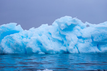 Iceberg floating in Atlantic Ocean Antarctic Peninsular © Ken Griffiths