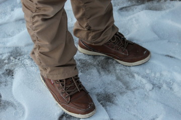 winter boots on snow