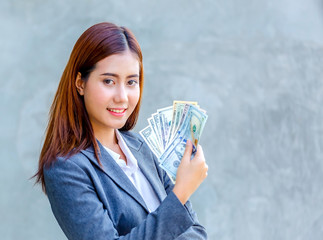 young woman with money in hand