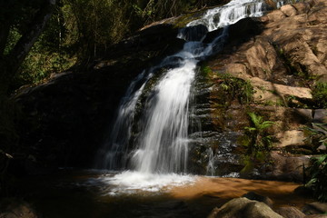 river water flowing on the stones