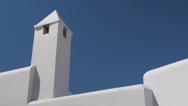 folegandros greece white house sky chimney