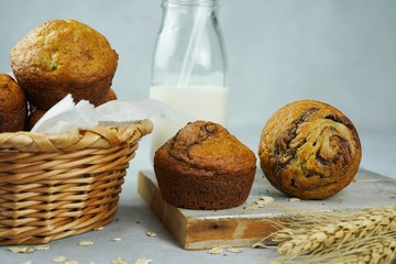 Homemade breakfast  Banana Muffins served with glass of milk