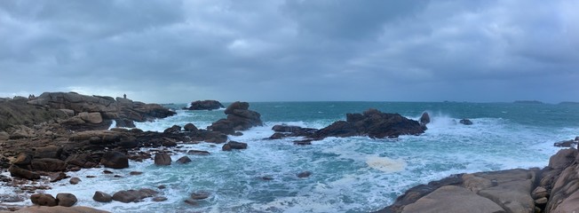 Beautiful view of the pink granite coast during storm in Brittany. France