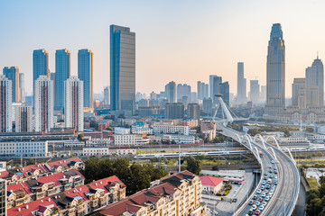 Early morning city scenery of Chifeng Bridge in Tianjin, China © Govan