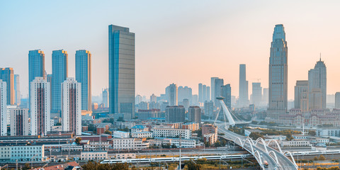 Early morning city scenery of Chifeng Bridge in Tianjin, China © Govan