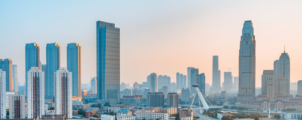 Early morning city scenery of Chifeng Bridge in Tianjin, China
