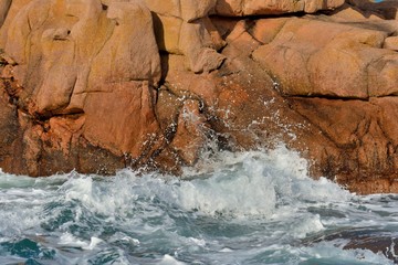 Beautiful view of the pink granite coast during storm in Brittany. France