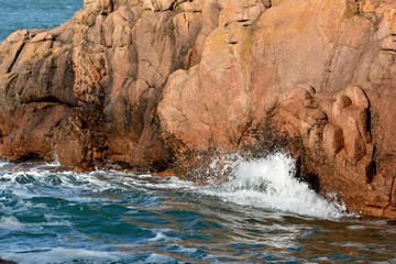 Fototapeta na wymiar Beautiful view of the pink granite coast during storm in Brittany. France
