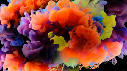 Color drops in water , abstract color mix , drop of Ink color mix paint falling on water Colorful ink in water