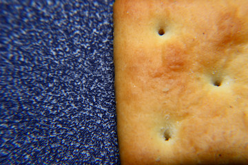 Close up of cracker with black background