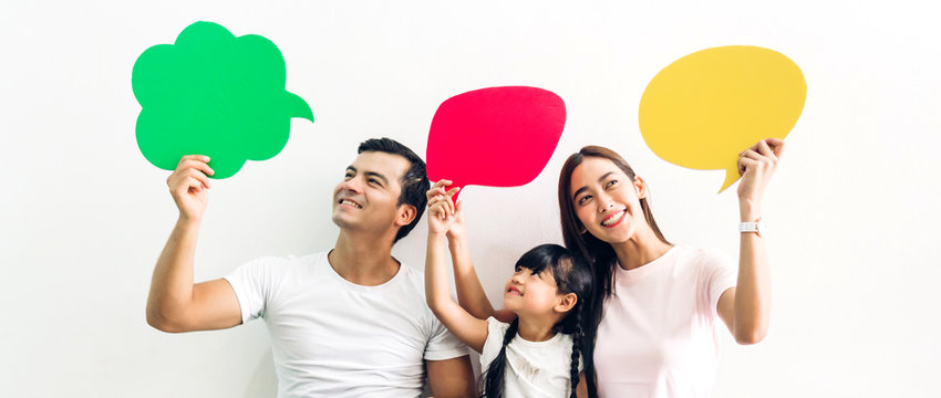 Happy Asian Family Father And Mother With Daughter Holding A Speech Bubble Icon