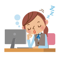 パソコンの前で居眠りするOL・事務職の女性