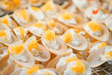 Thai pancake. Also known as Thai crispy pancakes or Kanom Buang in Thai local language. It's a popular street food in Thailand. Filled with coconut sweet cream and topping either sweet and salty. 