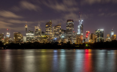 sydney city night scene and reflections on water