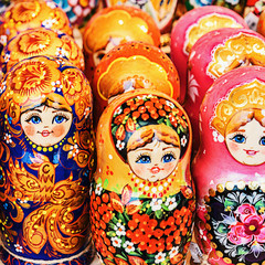 Colorful Russian Nesting Dolls Matreshka At The Market. Matrioshka Babushka Nesting Dolls Are The Most Popular Souvenirs From Russia.
