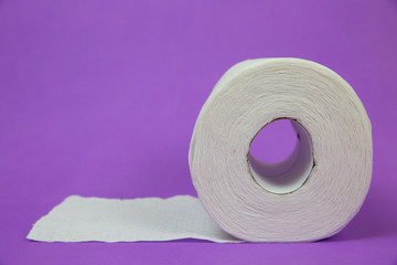 Roll of Toilet Paper on Purple Background