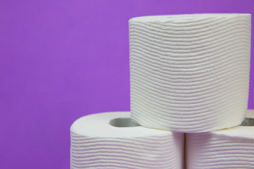 Toilet Paper on Purple Background