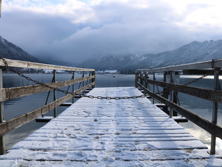 Snowy lakeside pier / jetty 
