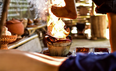 The herbal oil massage with heated feet is an ancient massage in northern Thailand.