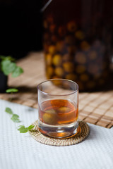 Umeshu or Japanese plum wine in glass.