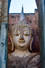 The Buddha statue of the Marvichai posture is named "Phra Achana", Wat Si Chum, Sukhothai Province, Thailand.