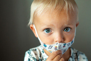 baby in medical mask