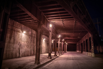 Dark and eerie urban city alley at night