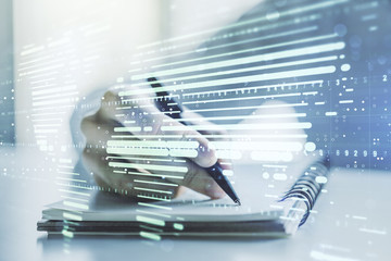 Double exposure of abstract digital world map and man hand writing in notepad on background, big data and blockchain concept