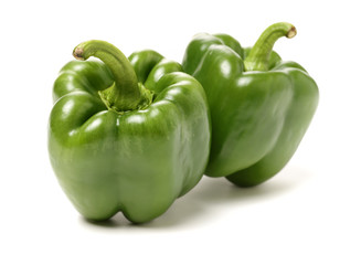 fresh green bell pepper (capsicum) on a white background