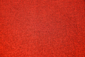 Red fabric for Interior decoration, sofa, headboard or curtain. Seamless close up texture and background.