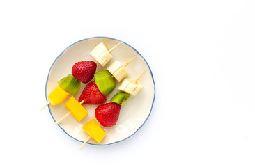 Healthy assorted fruit skewers from above