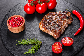 Ribeye steak with potatoes, onions and cherry tomatoes