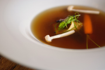 Close-up of a bowl of soup with vegetables