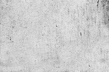 Texture of a concrete wall with cracks and scratches which can be used as a background