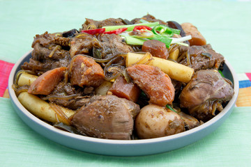 Korean chicken stew with soy sauce, glass noodle, rice cake and vegetables
