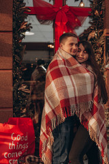 young couple hug and kiss on the street