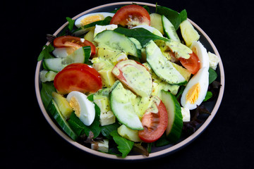 Egg, Feta, and some vegetable salad like cucumber, tomato and potato