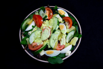 Egg, Feta, and some vegetable salad like cucumber, tomato and potato