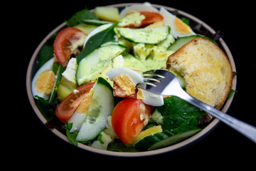 Egg, Feta, and some vegetable salad like cucumber, tomato and potato